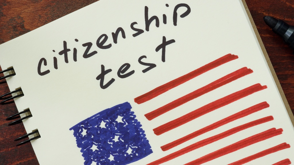 Notepad with words citizenship test and American flag