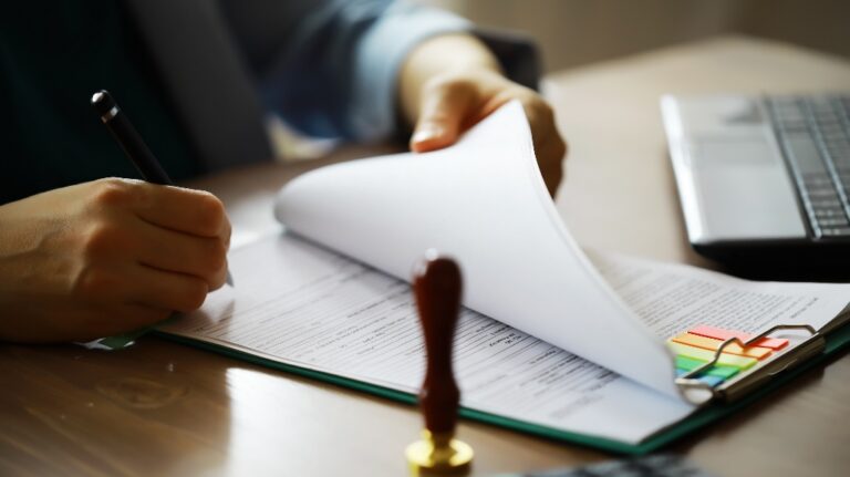 Man is working with documents