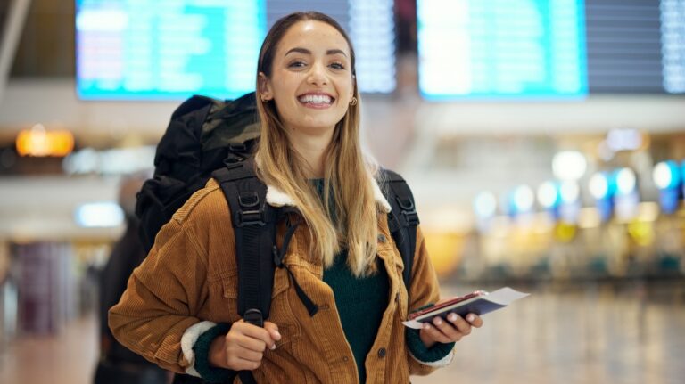 woman with passport, flight ticket or information of immigration